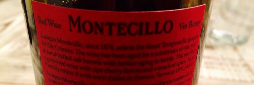 Somehow the back's even harder to photograph than the front.  Black on dark red = yikes.